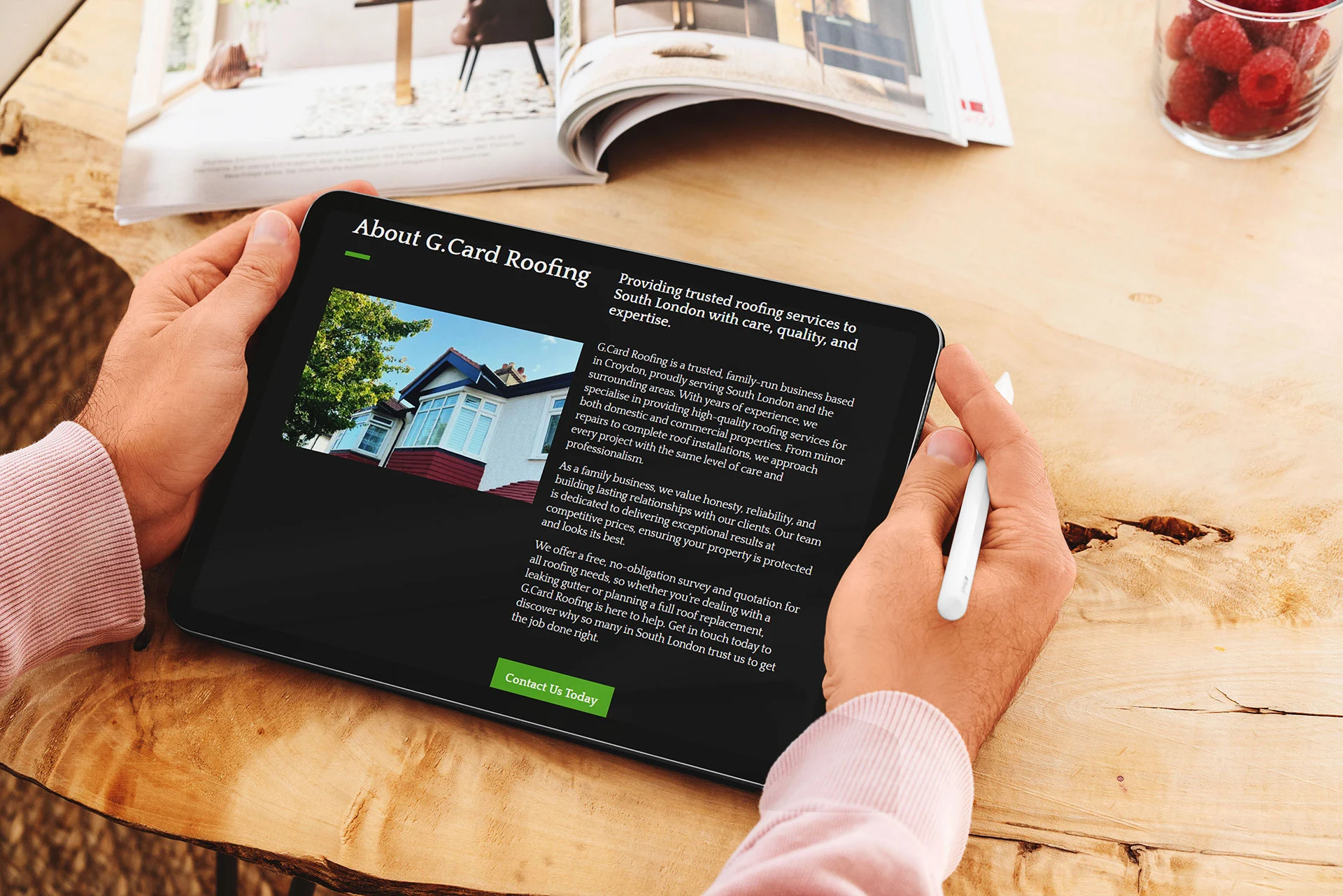 A tablet computer showing G.Card Roofing's new website