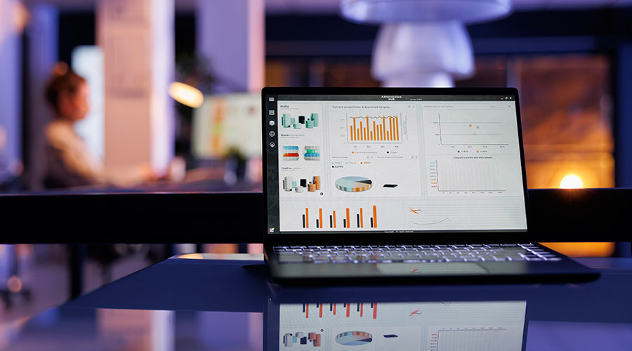 A laptop with an analytics report on the screen