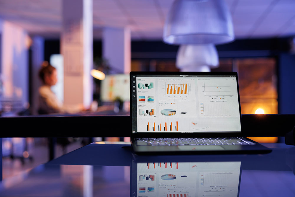 A laptop with an analytics report on the screen