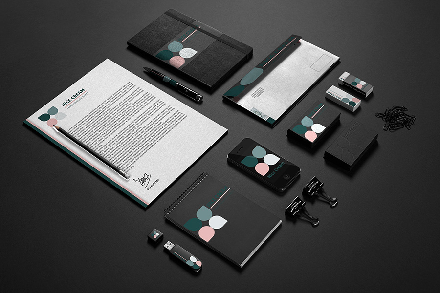 A flat lay representation of different business branding products for a client