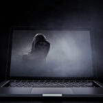A laptop with the grim reaper on the screen to represent a neglected website