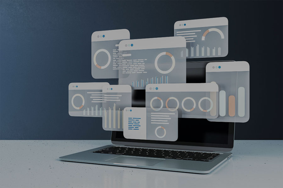 A laptop showing different screens relating to website management and how well the website is performing